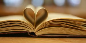 Book pages folded to form a heart